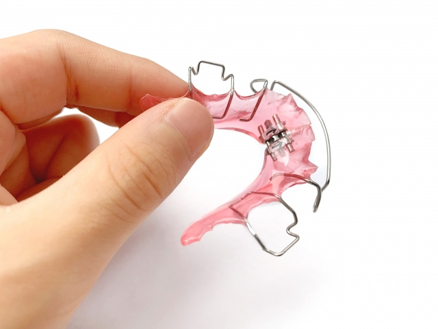 拡大床を持つ手